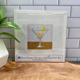 Lifestyle Martini on a striped background Needlepoint Kit