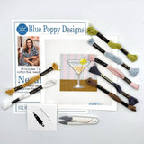 Lifestyle Martini on a striped background Needlepoint Kit 